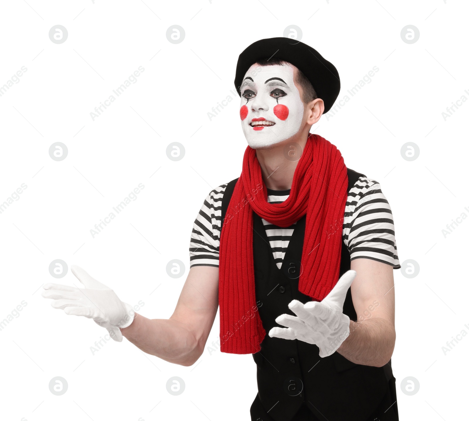 Photo of Funny mime artist in beret posing on white background