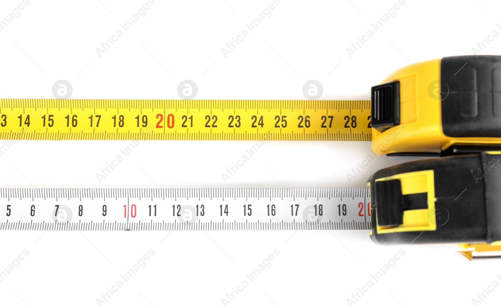 Photo of Measuring tapes on white background