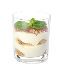 Photo of Delicious tiramisu in glass and mint leaves isolated on white