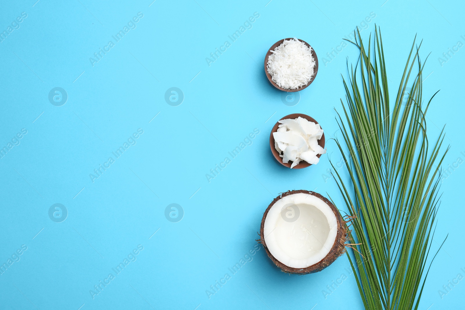 Photo of Composition with coconut flakes on color background, top view