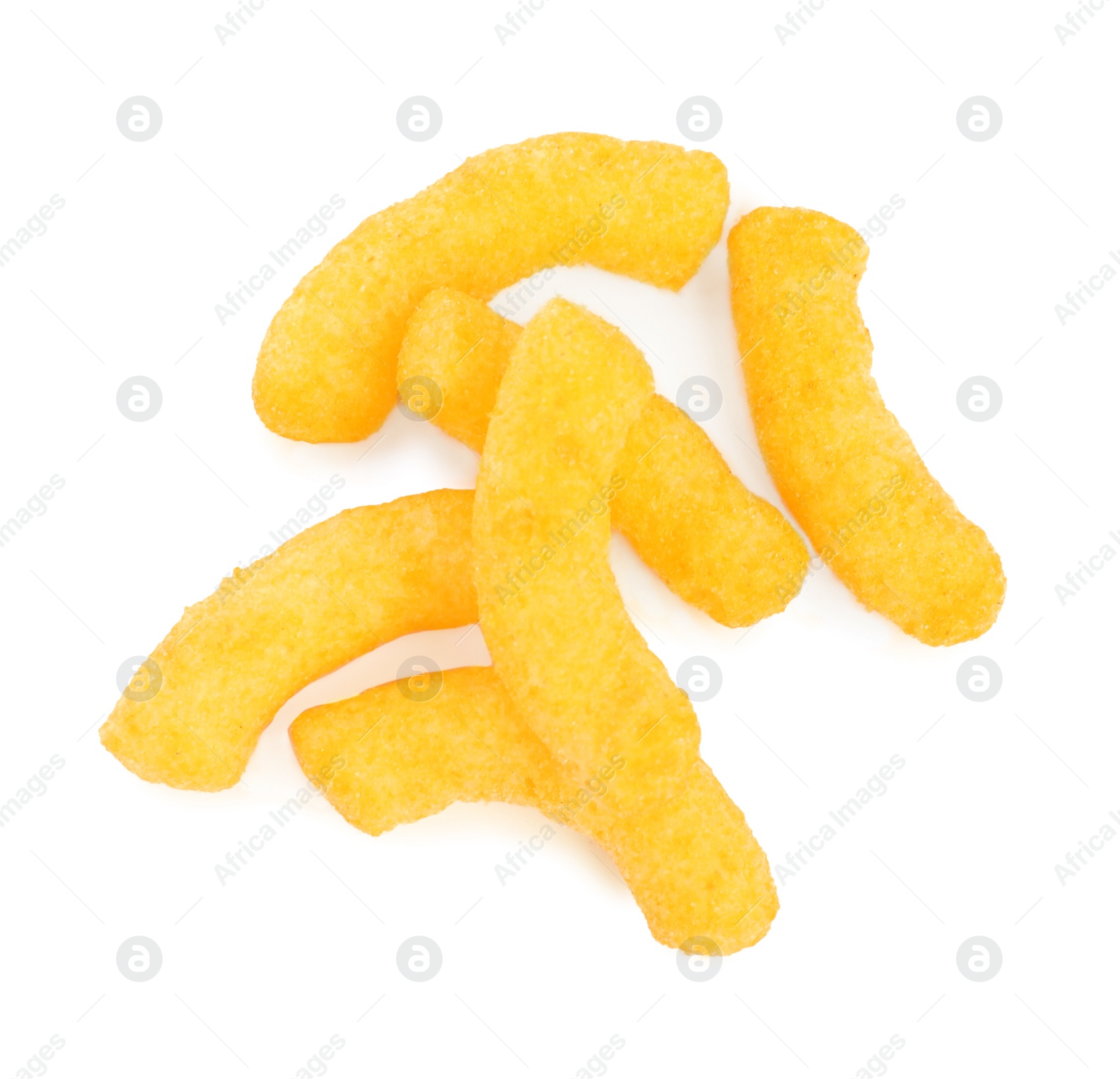 Photo of Many tasty cheesy corn puffs isolated on white, top view