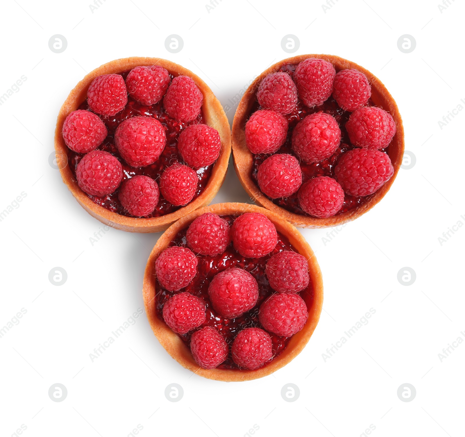 Photo of Tartlets with fresh raspberries isolated on white, top view. Delicious dessert