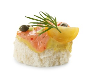 Photo of Tasty canape with salmon, tomatoes, capers and herbs isolated on white