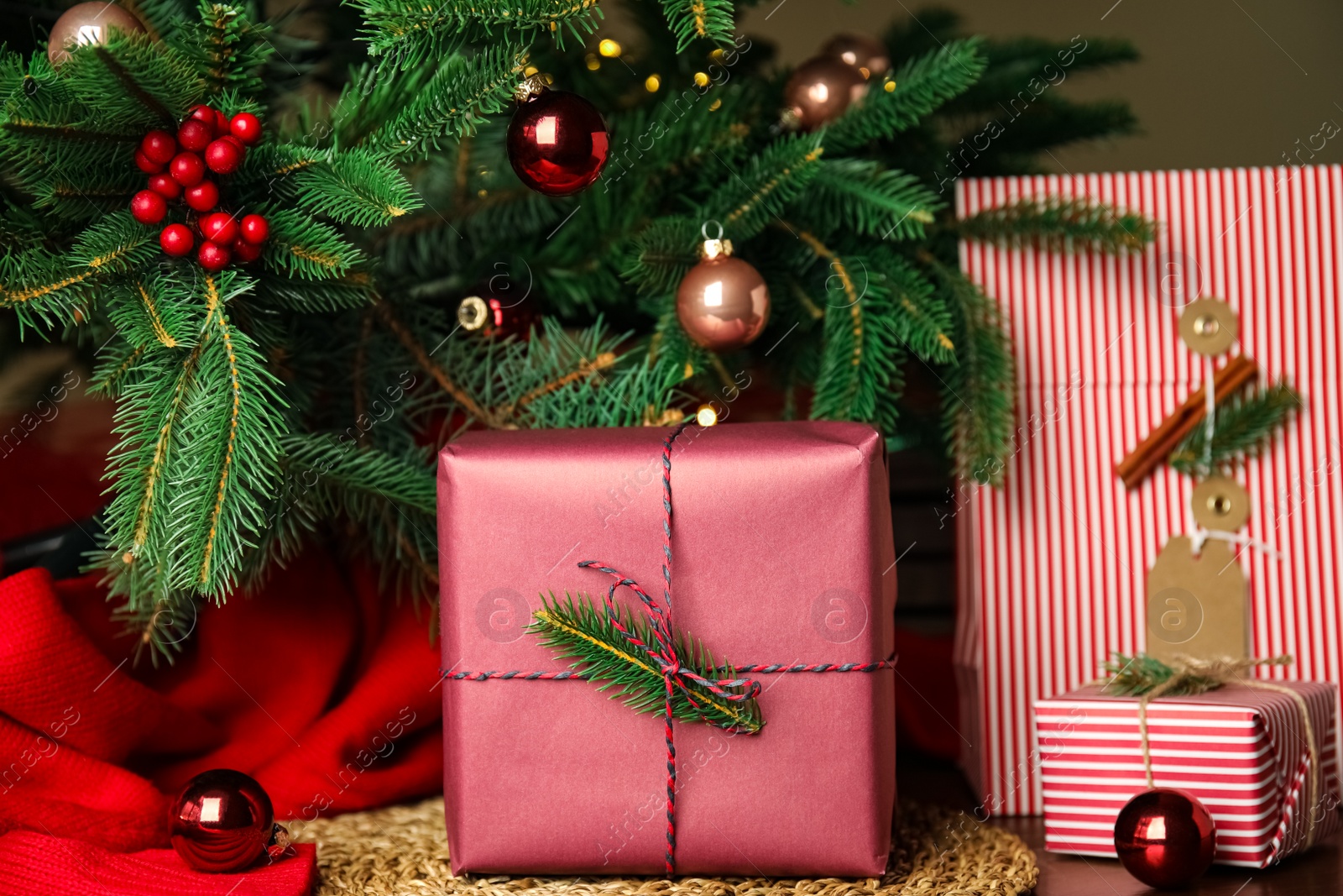 Photo of Composition with beautifully wrapped gift boxes on table