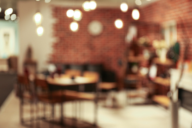 Photo of Blurred view of furniture store in mall. Bokeh effect