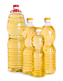 Photo of Bottles of cooking oil on white background