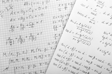 Photo of Sheets of paper with different mathematical formulas, top view