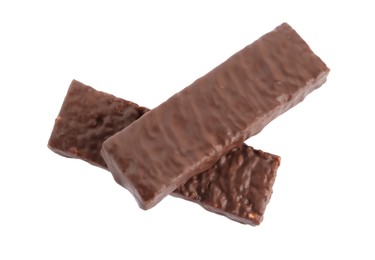 Photo of Tasty chocolate glazed protein bars on white background, top view. Healthy snack