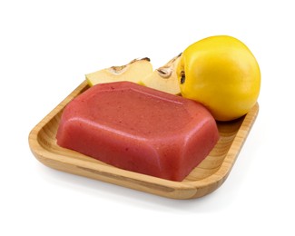 Photo of Delicious sweet quince paste and fresh fruits isolated on white