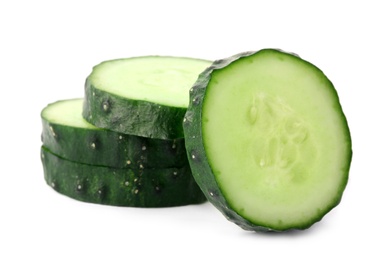 Photo of Slices of fresh cucumber on white background