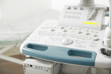 Photo of Ultrasound control panel indoors, closeup. Medical equipment