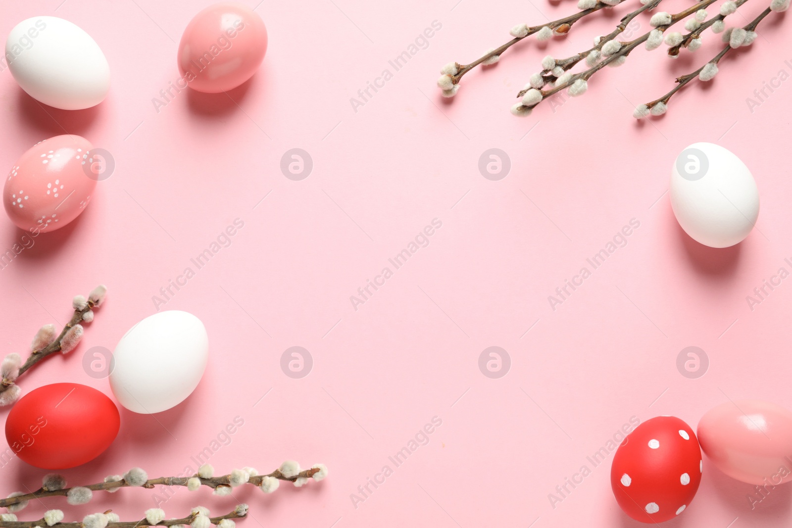 Photo of Flat lay composition with painted Easter eggs on color background, space for text