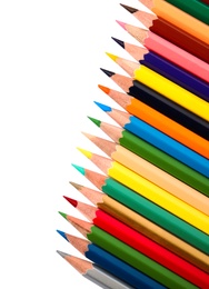 Photo of Different color pencils on white background, top view. School stationery