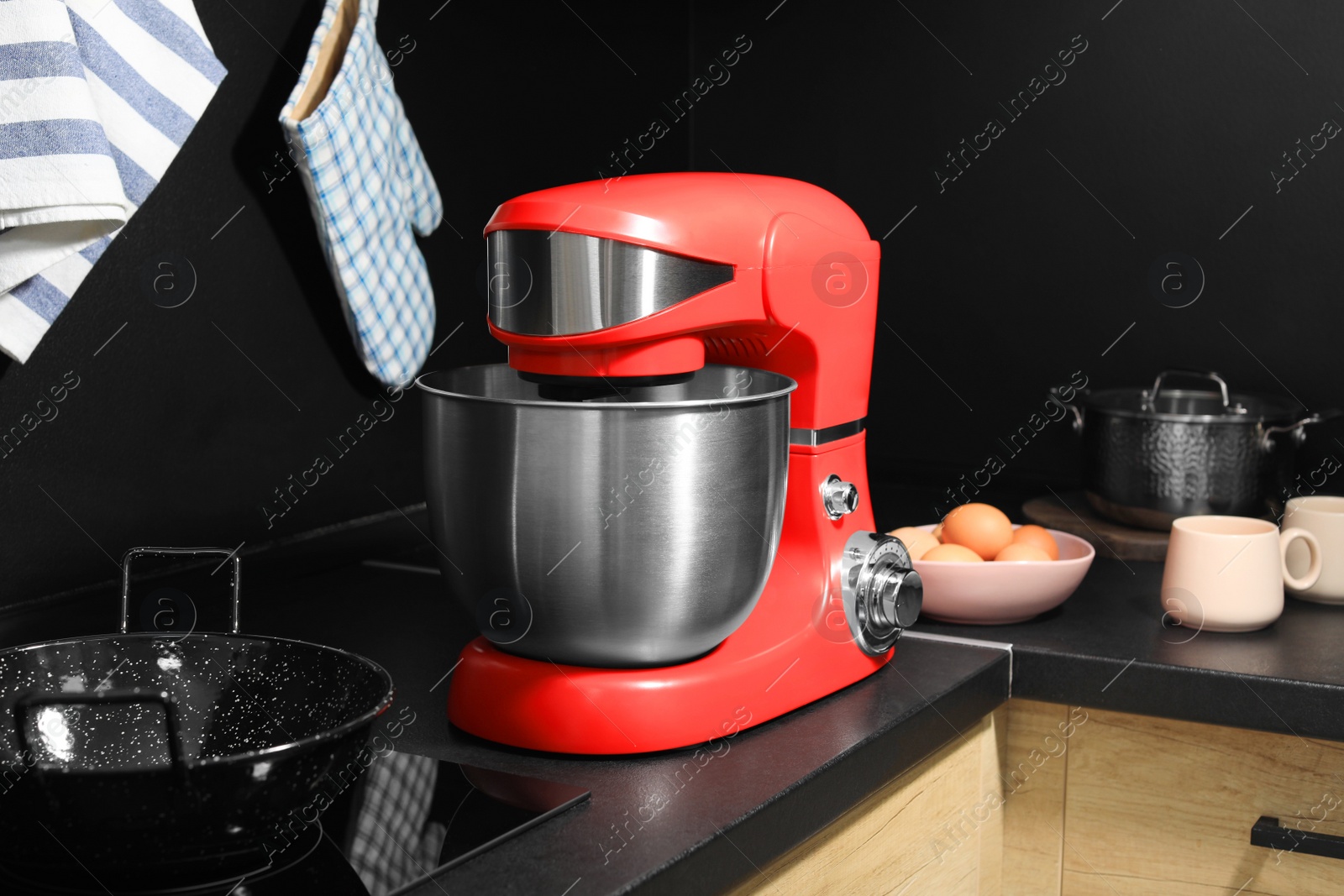 Photo of Modern stand mixer on countertop in kitchen