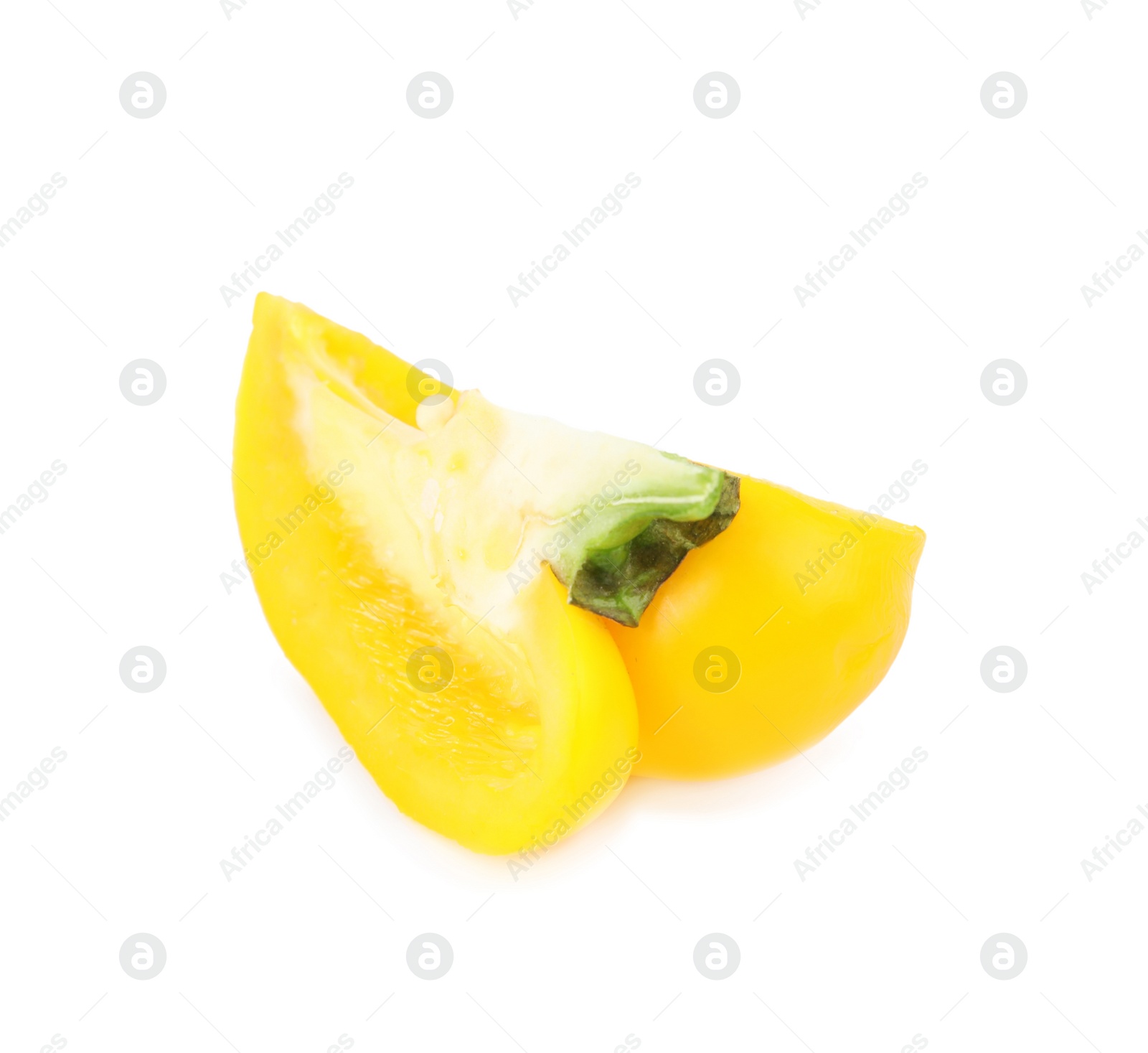 Photo of Cut yellow bell pepper with seeds isolated on white