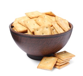 Tasty crackers in bowl isolated on white