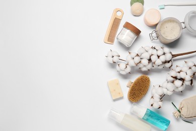 Bath accessories. Flat lay composition with personal care products on white background, space for text