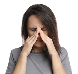 Mature woman suffering from headache on white background