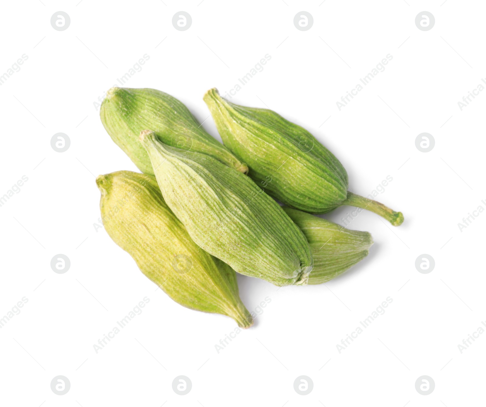 Photo of Pile of dry green cardamom on white background, top view