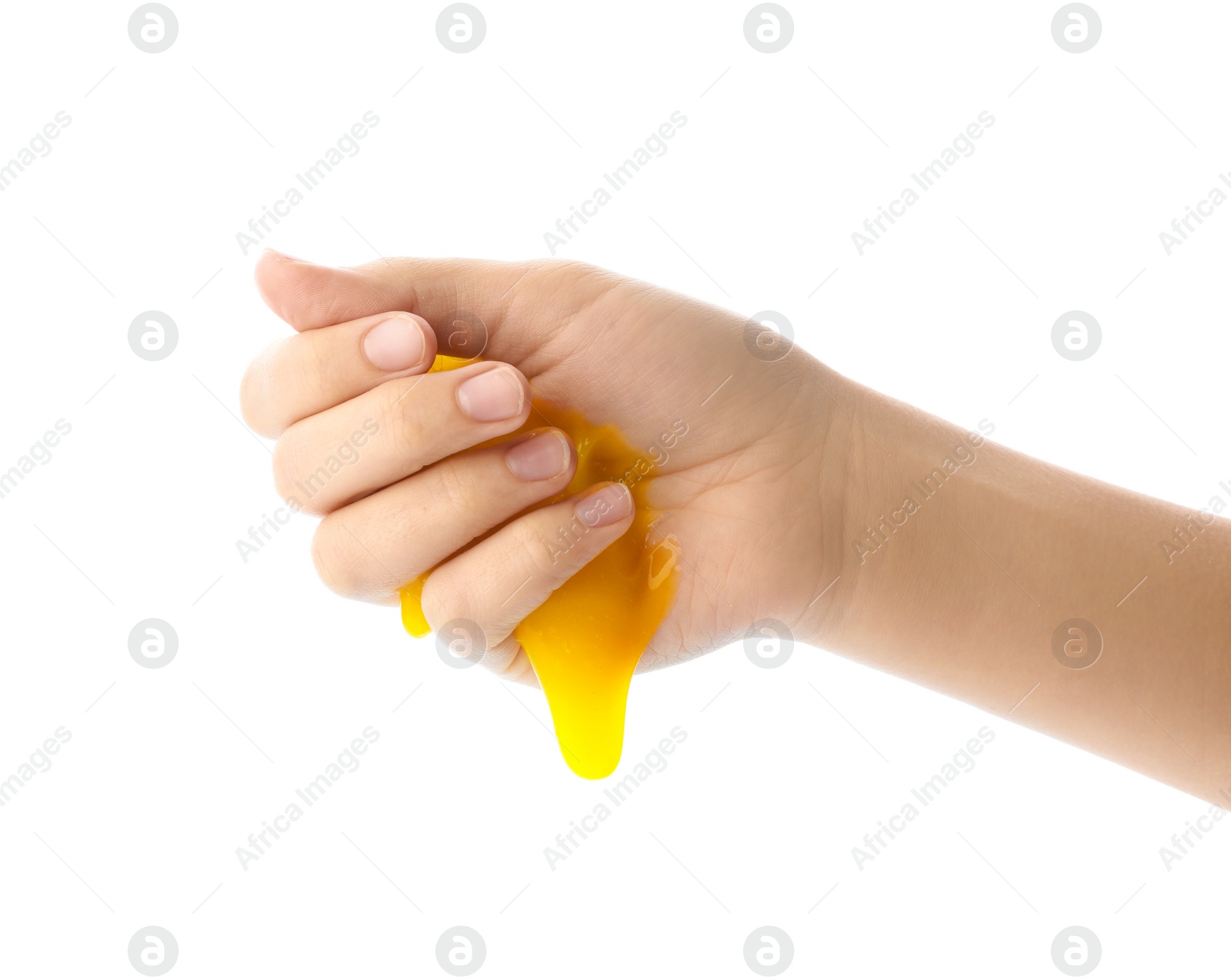 Photo of Woman playing with yellow slime isolated on white, closeup. Antistress toy