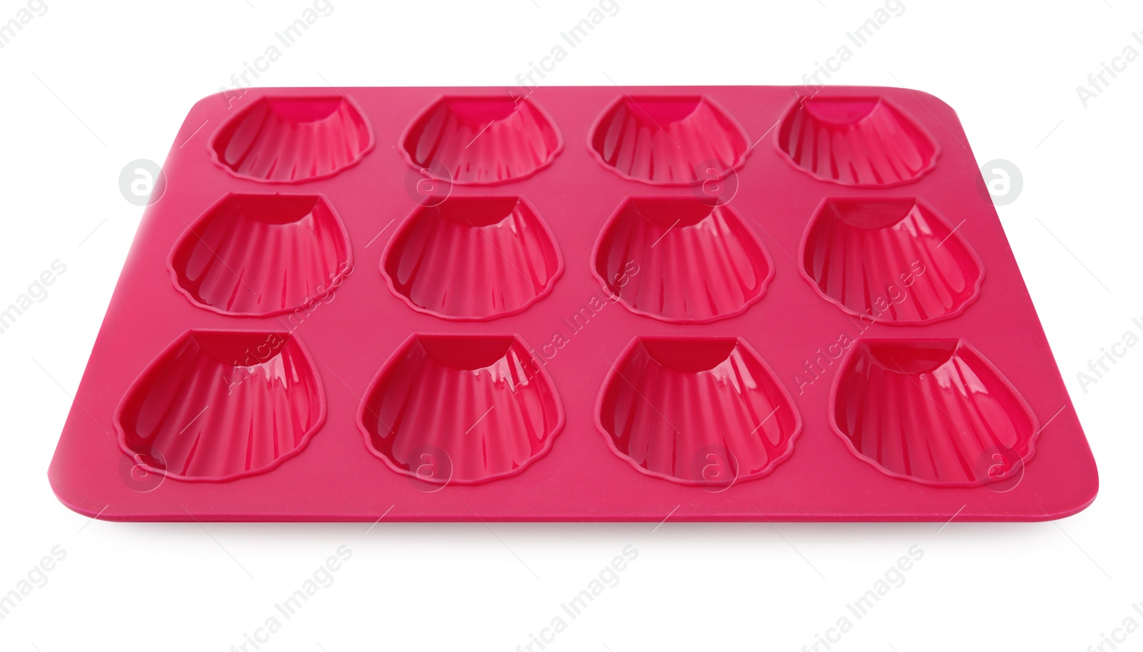 Photo of Red baking mold for madeleine cookies isolated on white