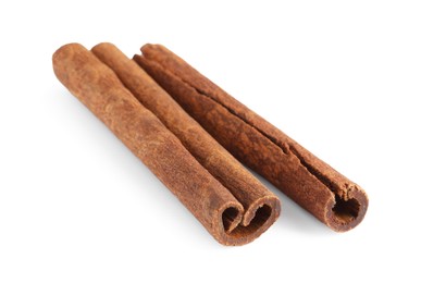 Photo of Two aromatic cinnamon sticks isolated on white