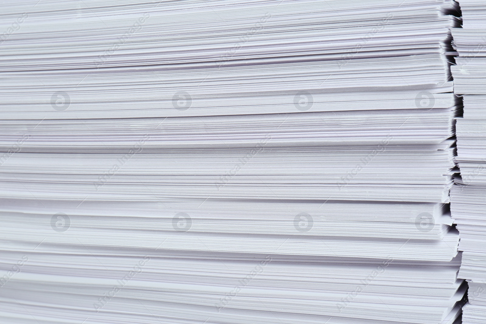 Photo of Stack of white paper sheets, closeup view