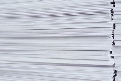 Photo of Stack of white paper sheets, closeup view