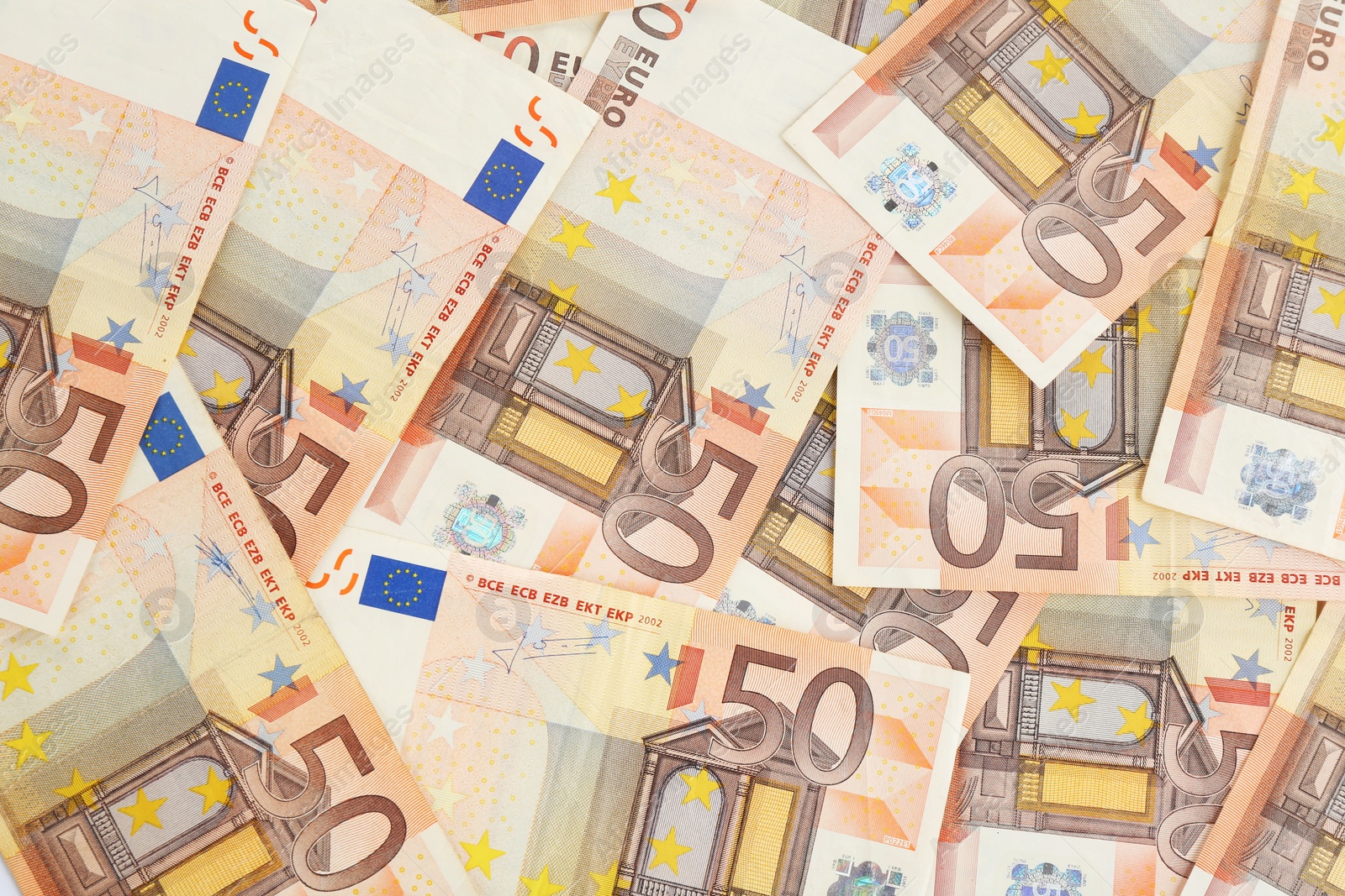 Photo of Euro banknotes as background, top view. Money and finance