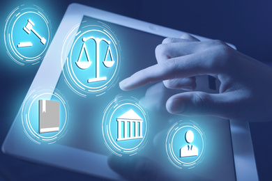 Image of Laws, legal information and online consultation. Woman using tablet, closeup. Icons over device