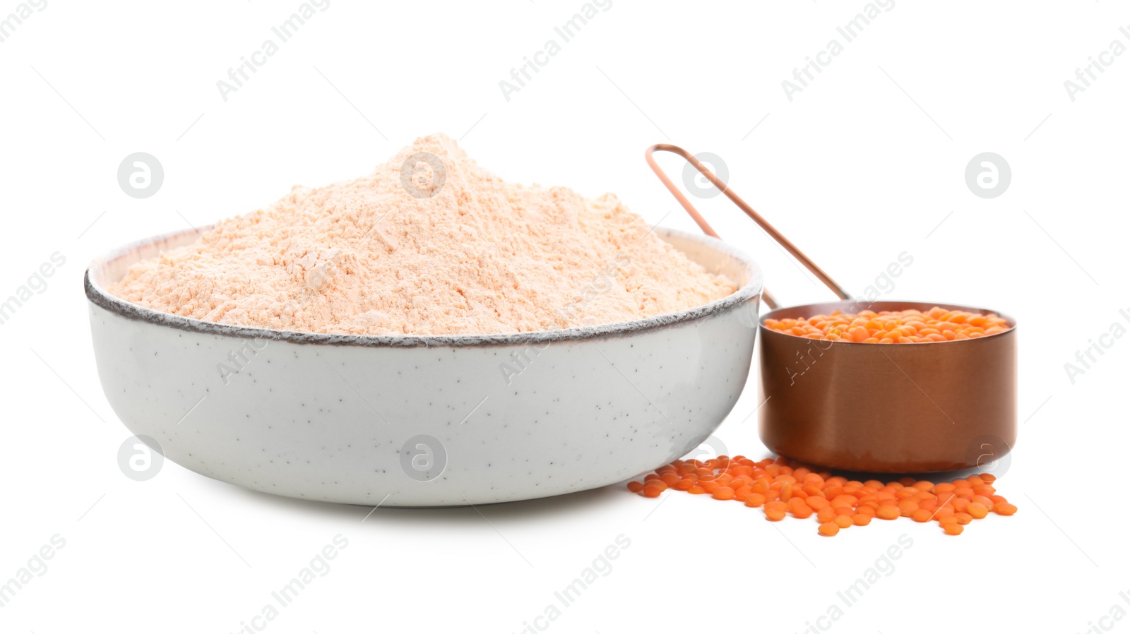 Photo of Lentil flour in bowl and seeds isolated on white