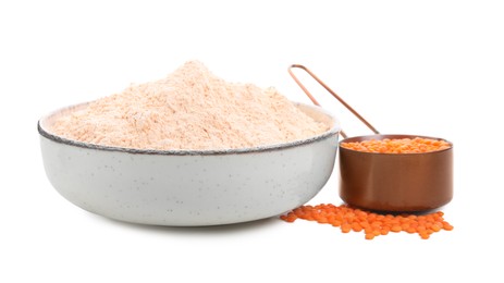 Lentil flour in bowl and seeds isolated on white