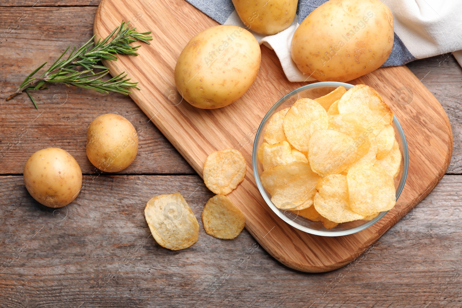 Photo of Flat lay composition with potato chips on table