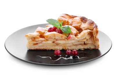 Photo of Slice of traditional apple pie with berries on white background
