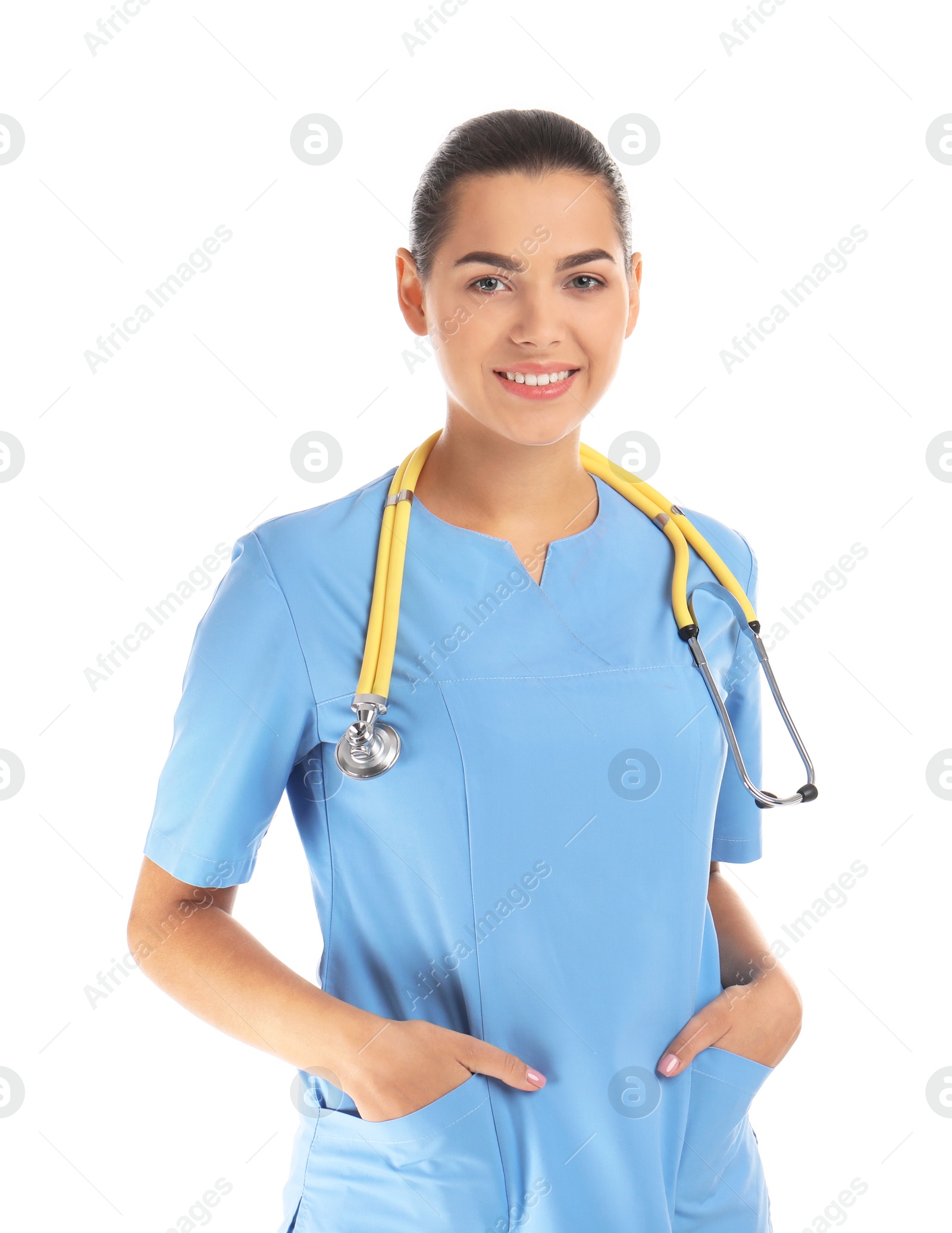 Photo of Portrait of young medical assistant with stethoscope on white background