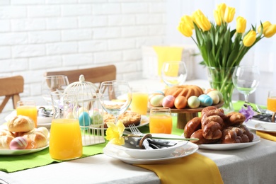 Festive Easter table setting with traditional meal at home