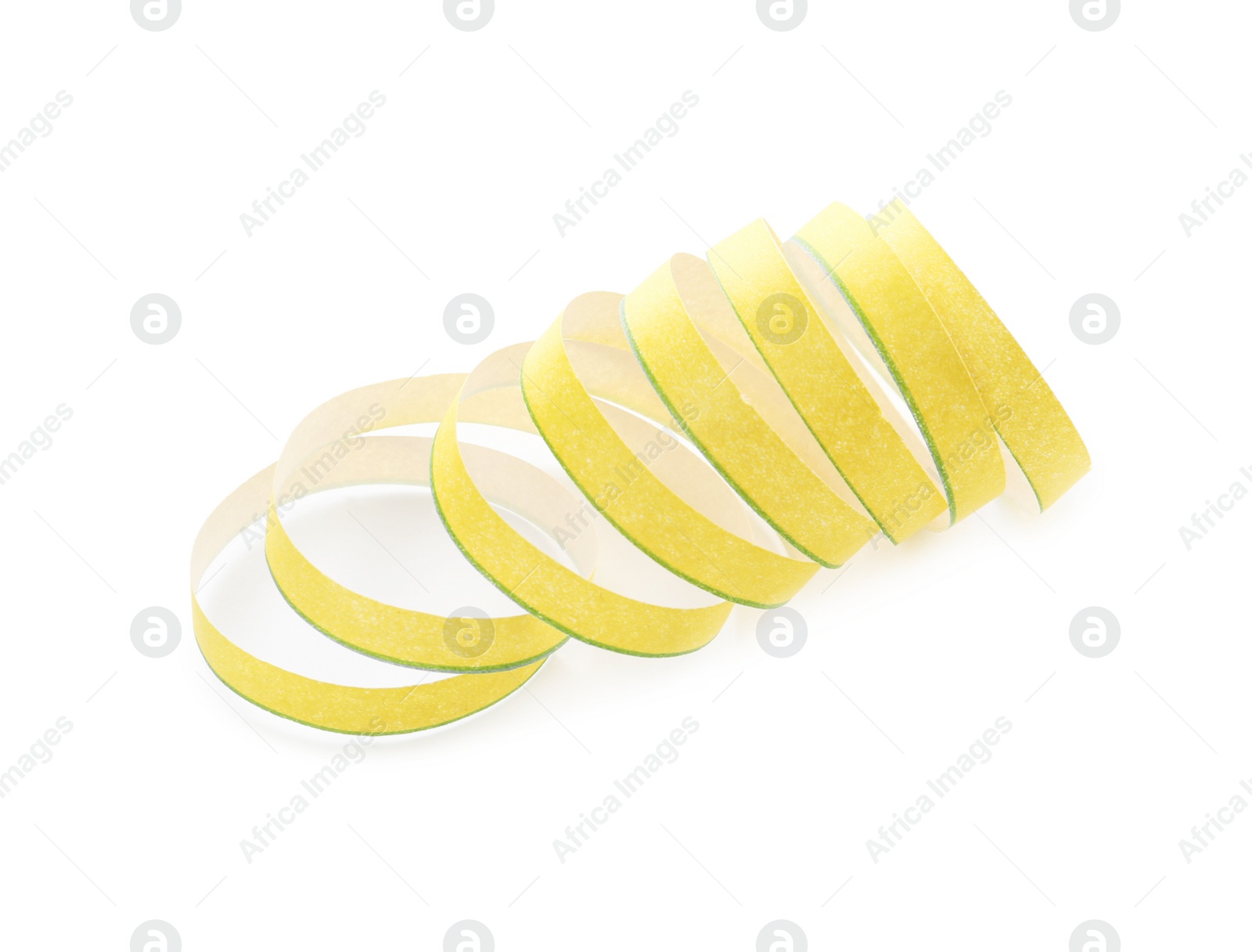 Photo of Yellow serpentine streamer on white background. Festive decor