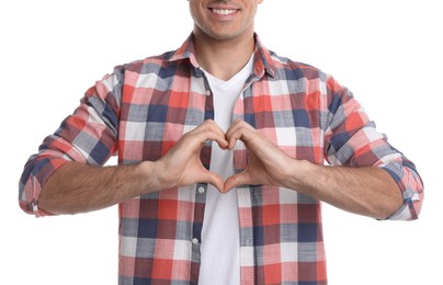 Photo of Man making heart with hands on white background, closeup