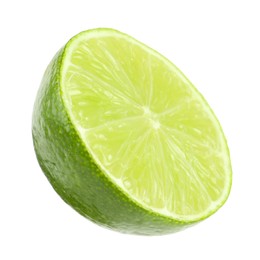 Half of fresh green ripe lime isolated on white