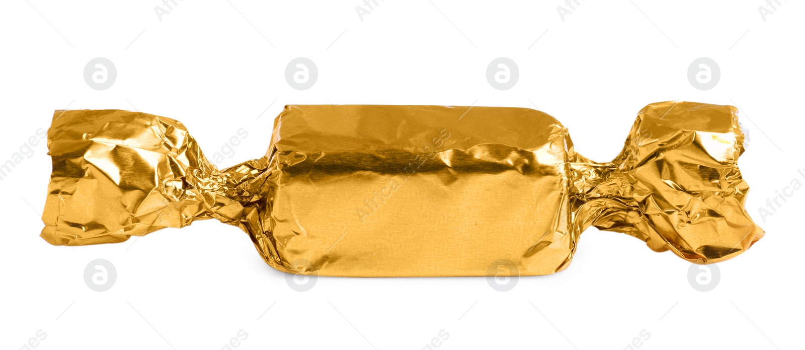 Photo of Tasty candy in golden wrapper isolated on white