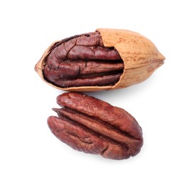 Photo of Two tasty pecan nuts isolated on white, top view