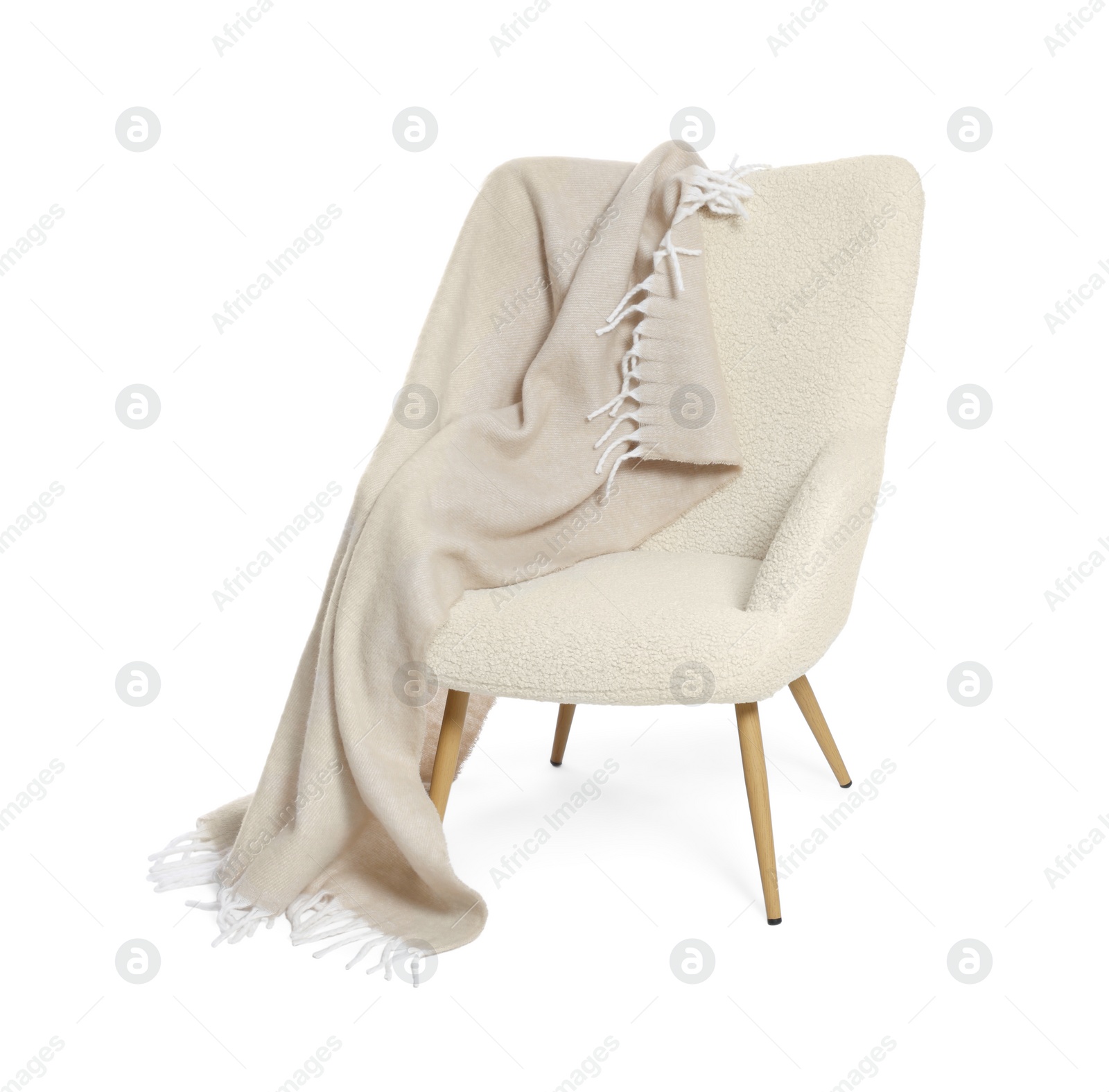 Photo of One stylish comfortable armchair with blanket isolated on white