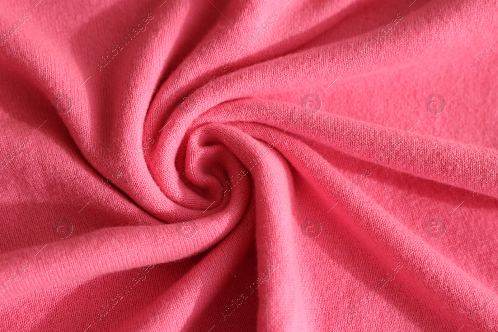 Photo of Beautiful pink fabric as background, top view