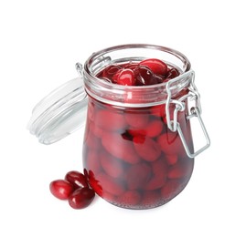 Delicious dogwood jam with berries on white background