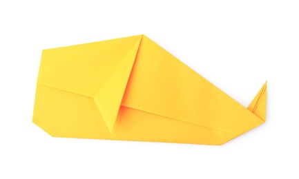 Photo of Folded yellow paper isolated on white, top view. Process of making origami