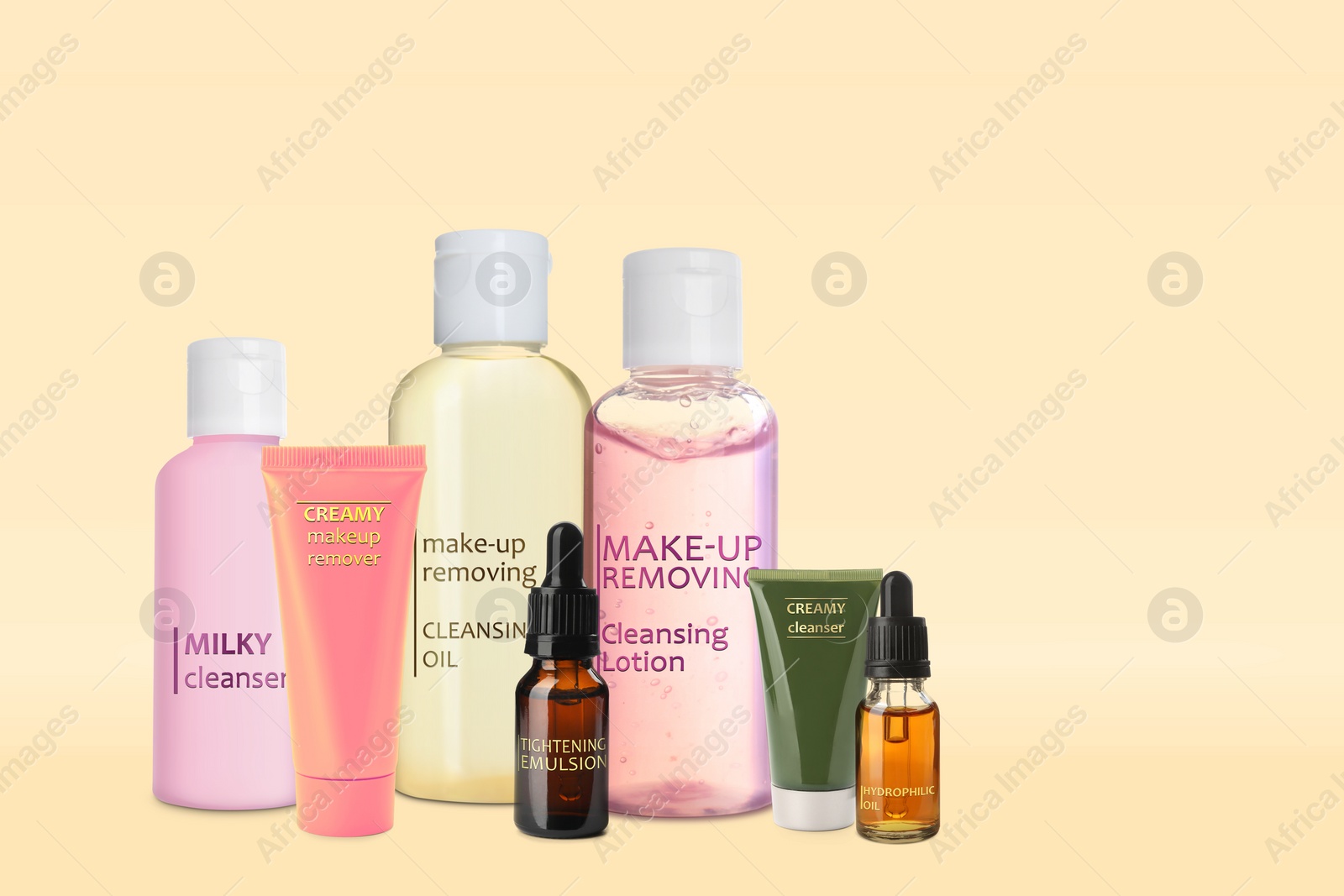 Image of Collection of different makeup removal products on beige background