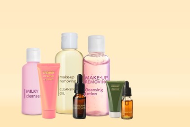 Collection of different makeup removal products on beige background