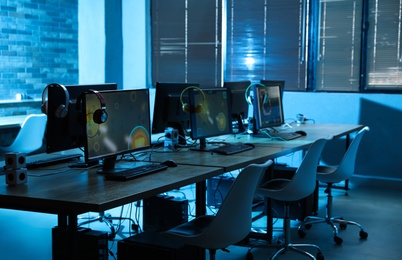 Internet cafe interior with modern computers. Video game tournament