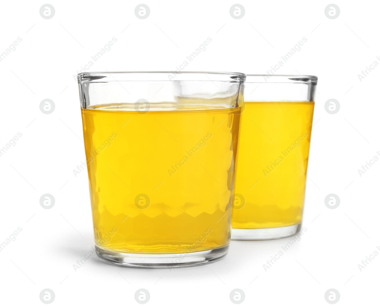 Photo of Tasty jelly desserts in glasses on white background