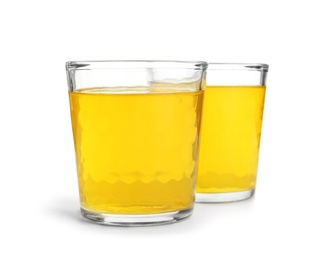 Photo of Tasty jelly desserts in glasses on white background